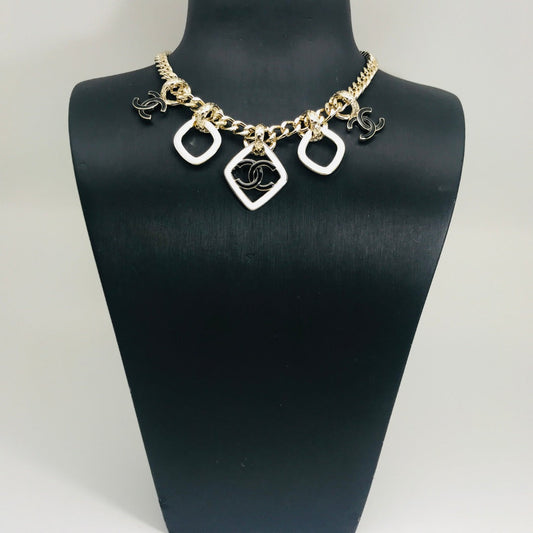 MULTI CHARM PINK GOLD BLACK ENAMEL NECKLACE