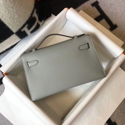 HERM Kelly Pochette Bag In God Epsom Leather