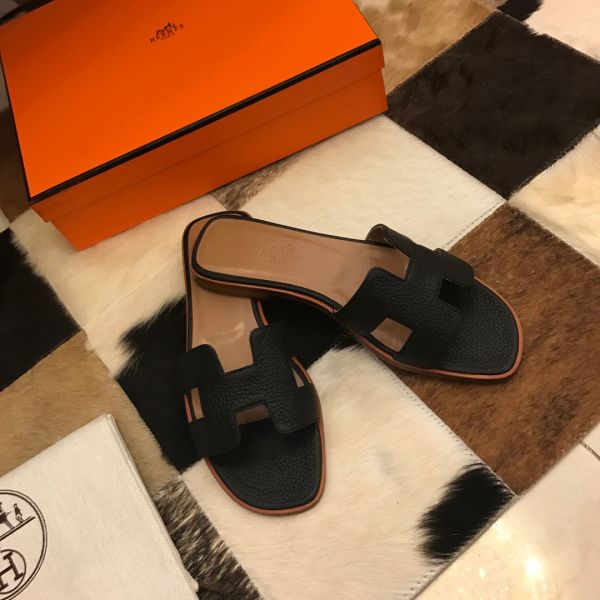 HERM Oran Slide Sandals In Black Clemence Leather