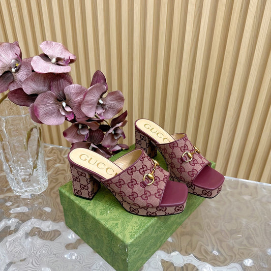 HORSEBIT SLIDE SANDAL IN WINE RED MONOGRAM CANVAS AND SHEEPSKIN LINING