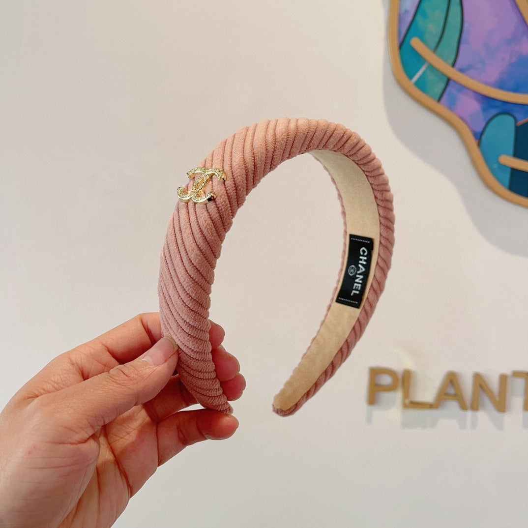 LIGHT PINK FABRIC HAIRBAND WITH GOLD LOGO 414436