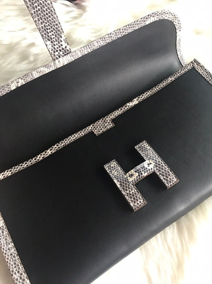 JIGE ELAN 29 CLUTCH IN BLACK CALFSKIN WITH WHITE LIZARD SKIN
