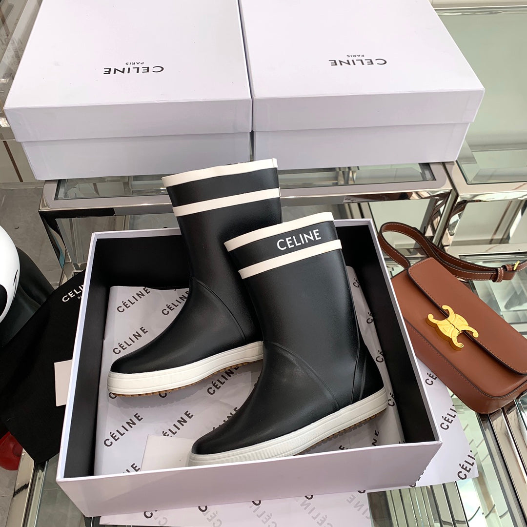RAIN BOOTS IN BLACK MIX WHITE RUBBER