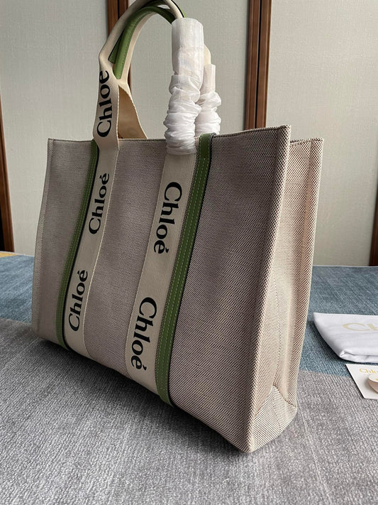 LAGRE WOODY TOTE BAG 45 IN BEIGE LINEN CANVAS BLACK WEBBING LOGO EMBROIDER GREEN CALFSKIN