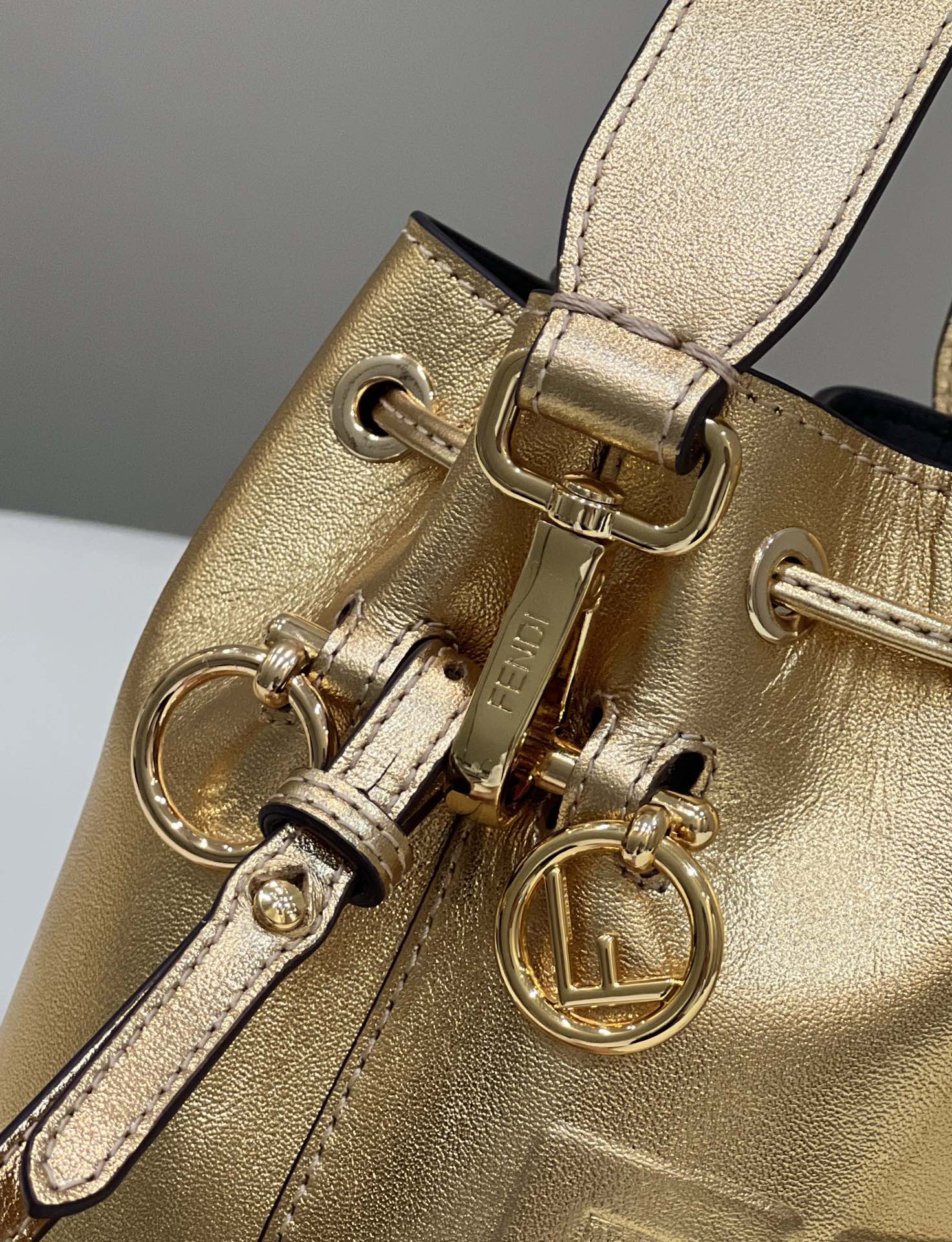 MON TRESOR 18 IN GOLD METALLIC CALFSKIN