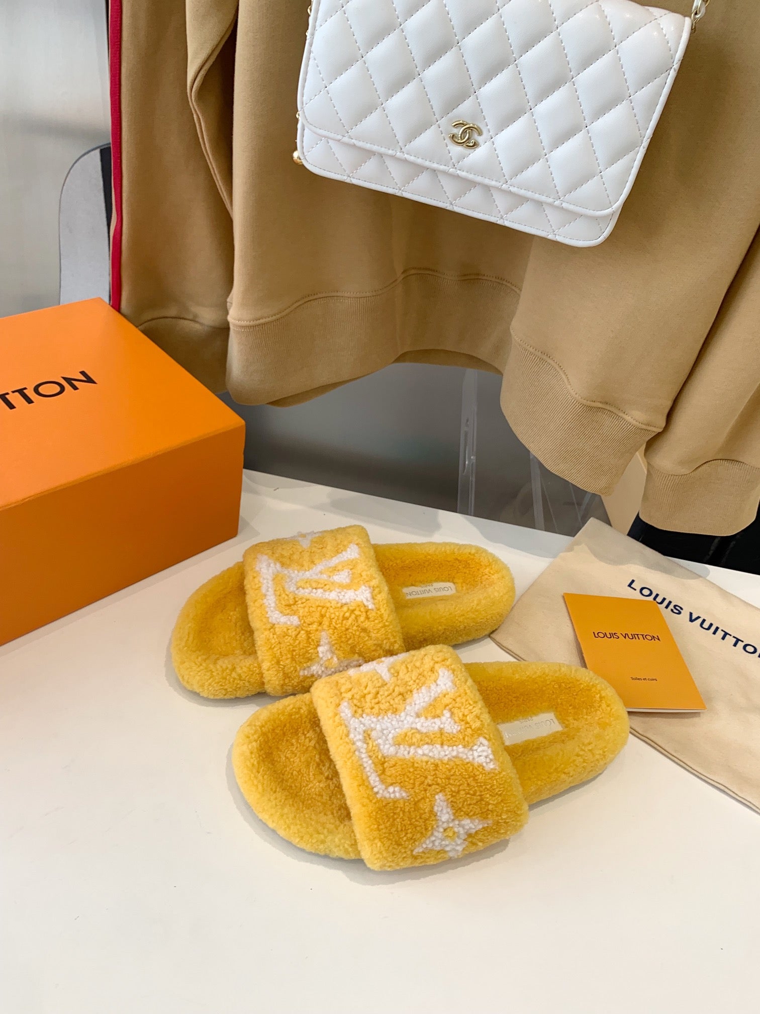 LV WOMEN'S PASEO FLAT SLIPPER IN YELLOW FLEECE WITH WHITE LOGO