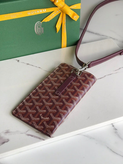 MONTMARTRE GM CASE 18 IN WINE RED GOYARDINE CANVAS