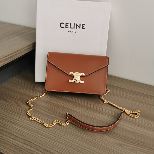 WALLET ON CHAIN MARGO 19 IN RUST ORANGE SMOOTH CALFSKIN GOLD HARDWARE