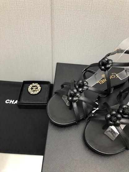 FLORAL FLAT SANDAL IN BLACK LAMBSKIN
