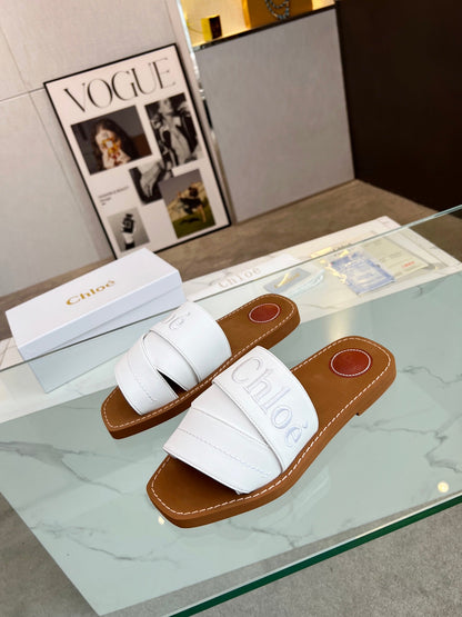 WOODY MULE IN WHITE LAMBSKIN WITH EMBROIDERED LOGO