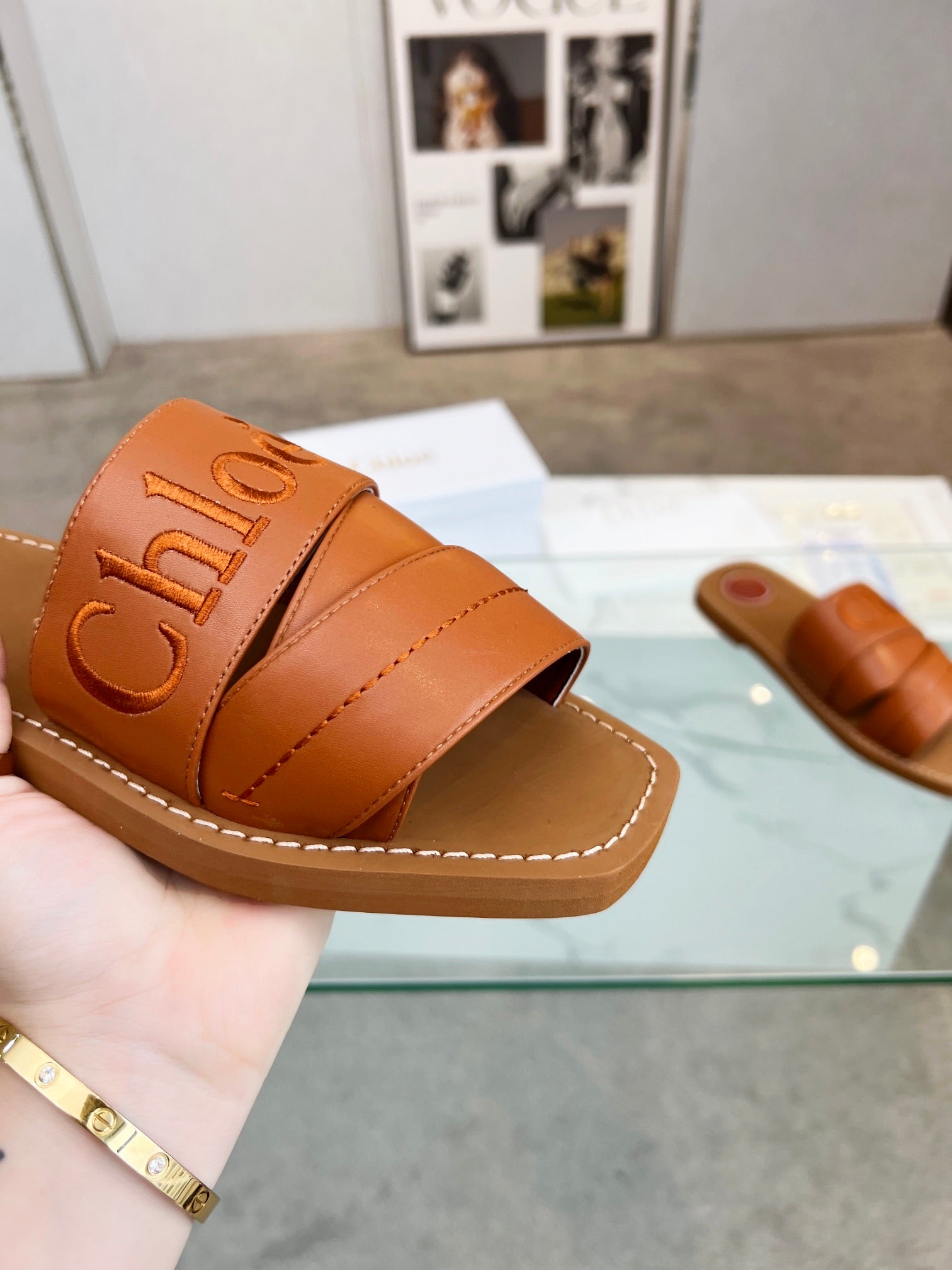 WOODY MULE IN BRONZE BROWM LAMBSKIN WITH EMBROIDERED LOGO