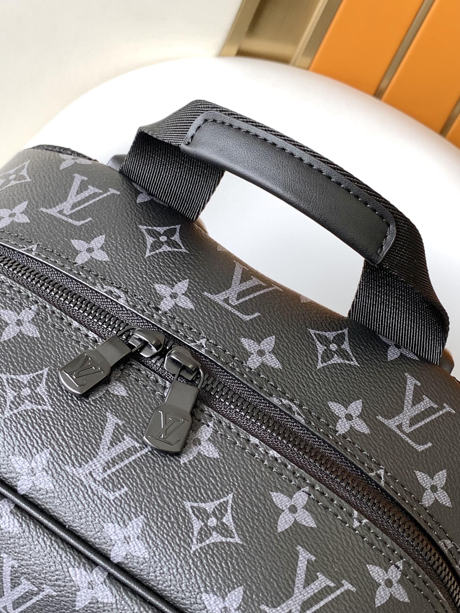 DISCOVERY BACKPACK 41 IN BLACK MONOGRAM MACASSAR CANVAS AND CALFSKIN