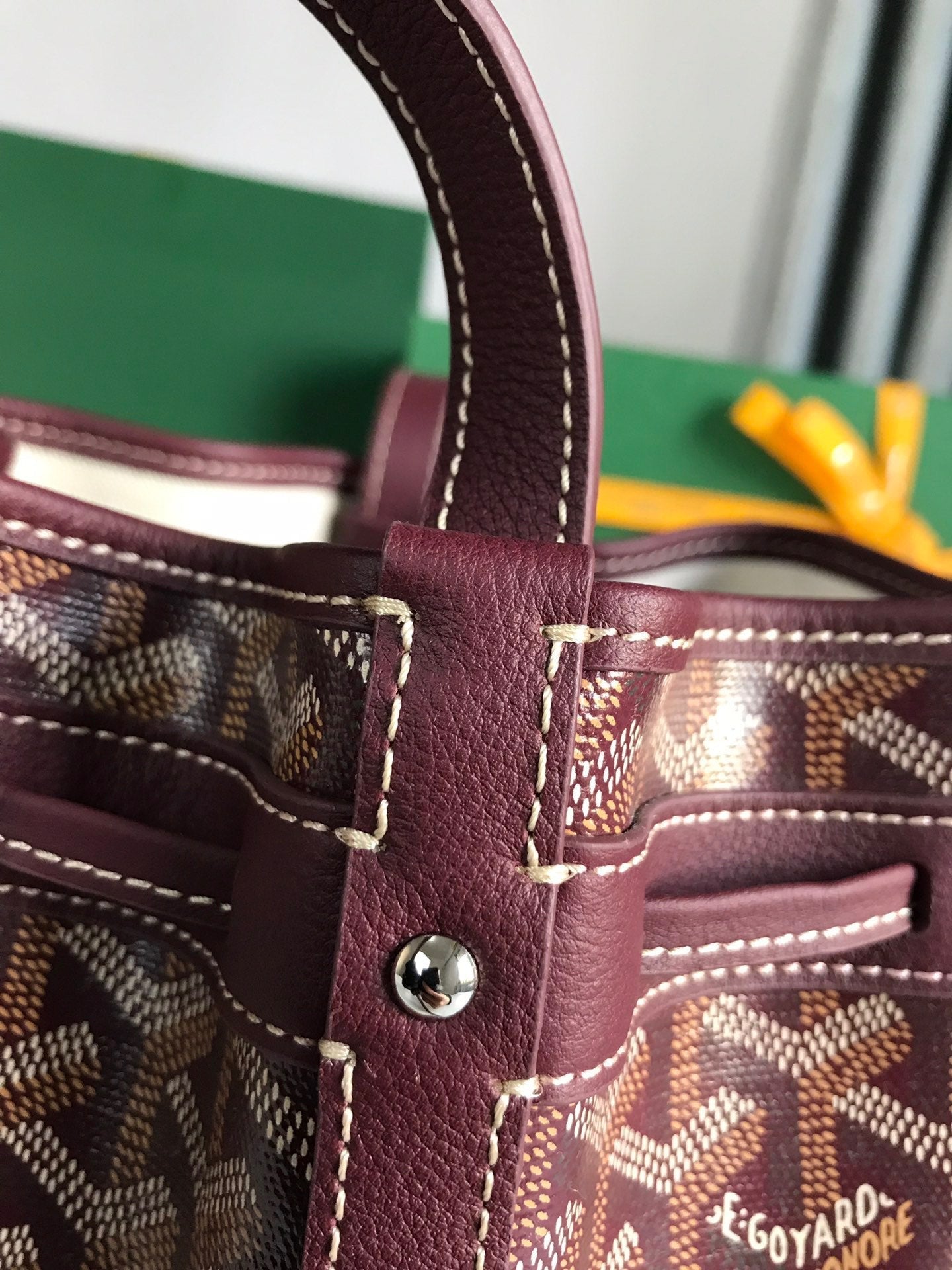PETIT FLOT BUCKET BAG 22 IN WINE RED GOYARDINE CANVAS AND LAMBSKIN TRIM