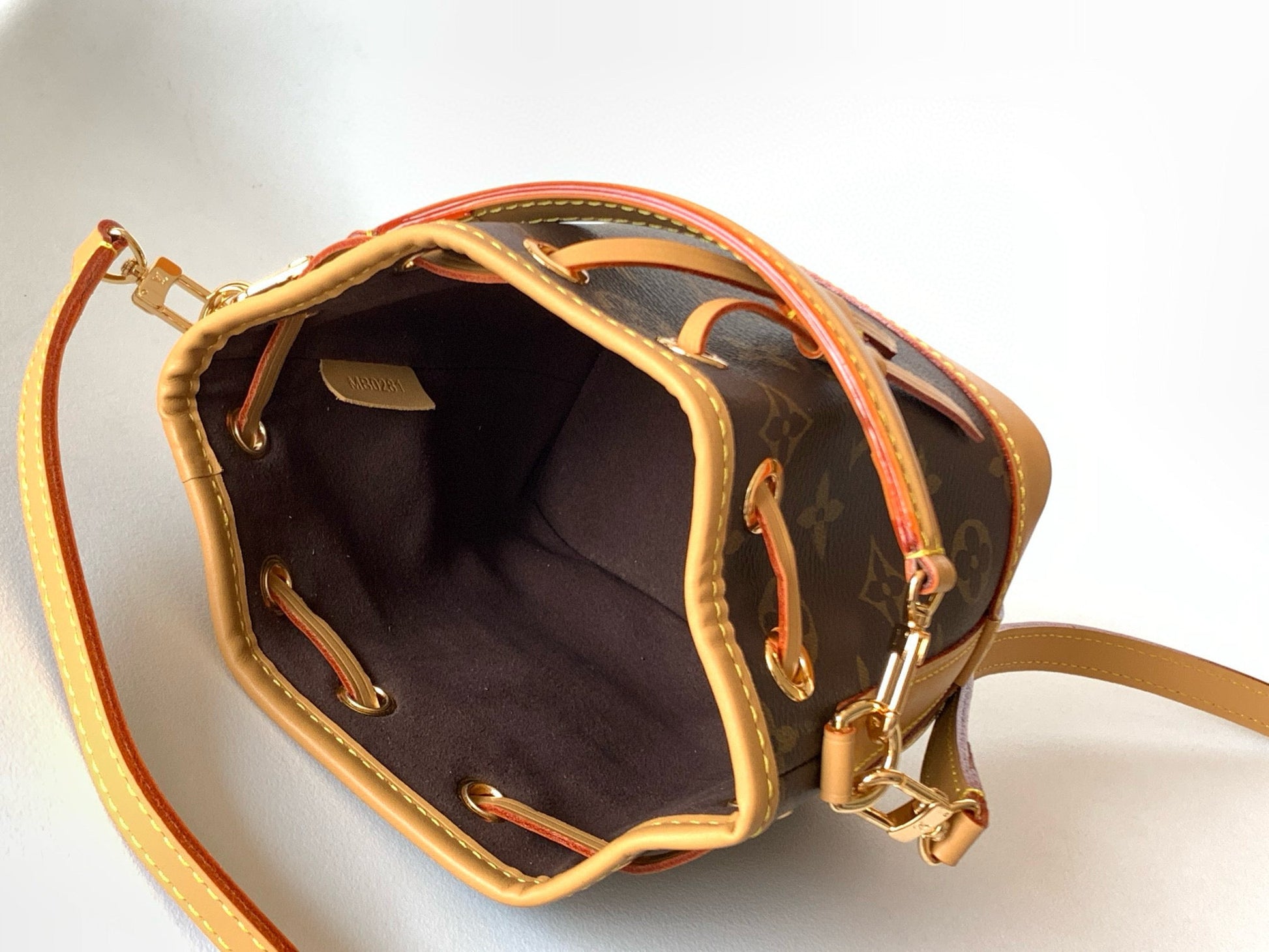 NANO NOÉ 16 IN BROWN MONOGRAM CALFSKIN