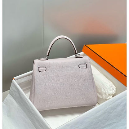 HERM Kelly 25cm Retourne Bag In Mauve Pale Clemence Leather