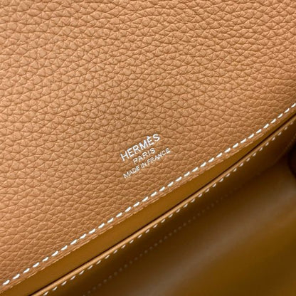 HERM Sac a Depeches 21 Bag in Gold Clemence Leather