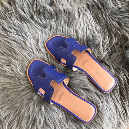 HERM Oran Slide Sandals In Blue Epsom Perforated Calfskin