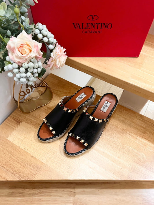 LACE-UP WEDGE SANDALS IN BLACK CALFSKIN WITH STUDS
