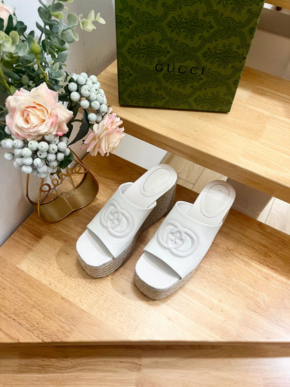 HIGH 10CM WEDGE SANDALS IN WHITE SHEEPSKIN