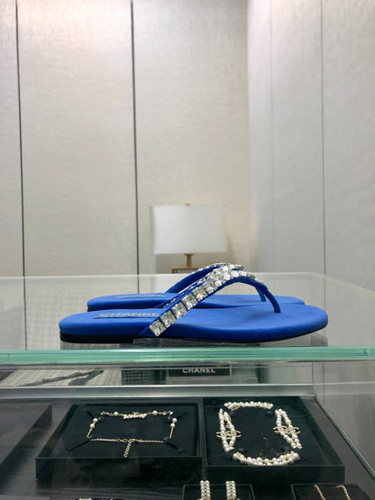 THONG SLIDE IN COBALT BLUE SUEDE WITH WHITE CRYSTALS