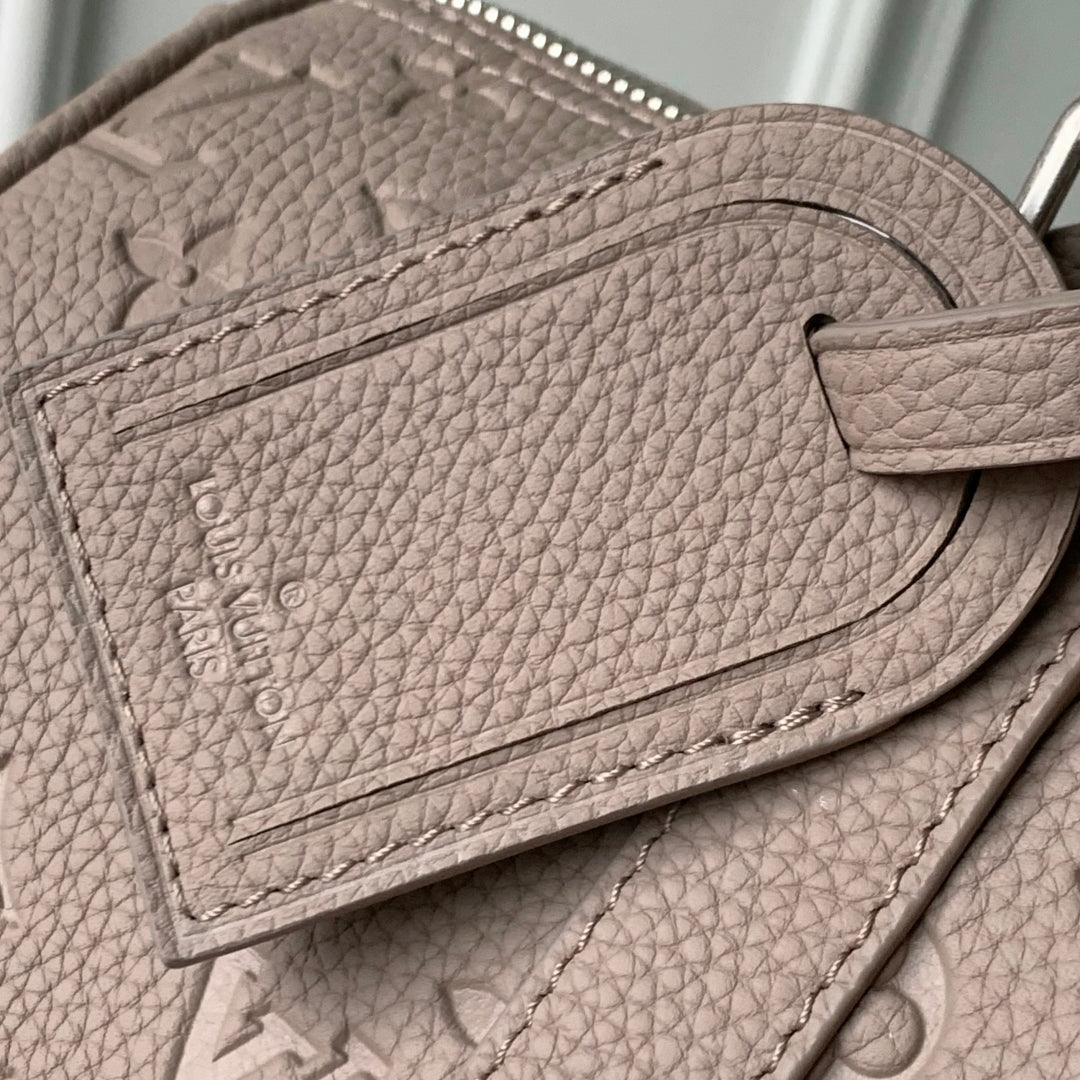 KEEPALL BANDOULIÈRE 34 BAG IN LIGHT BROWN MONOGRAM TAURILLON CALFSKIN