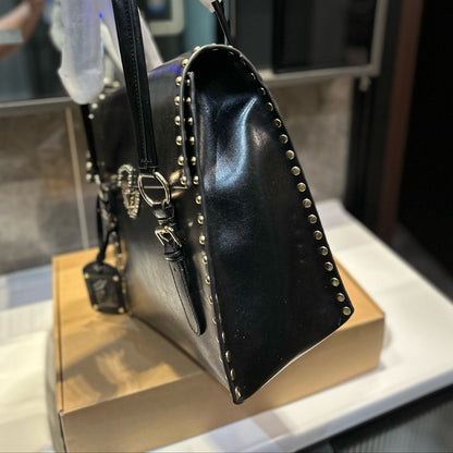 STUDDED TOP HANDLE BAG 33 IN BLACK SMOOTH CALFSKIN