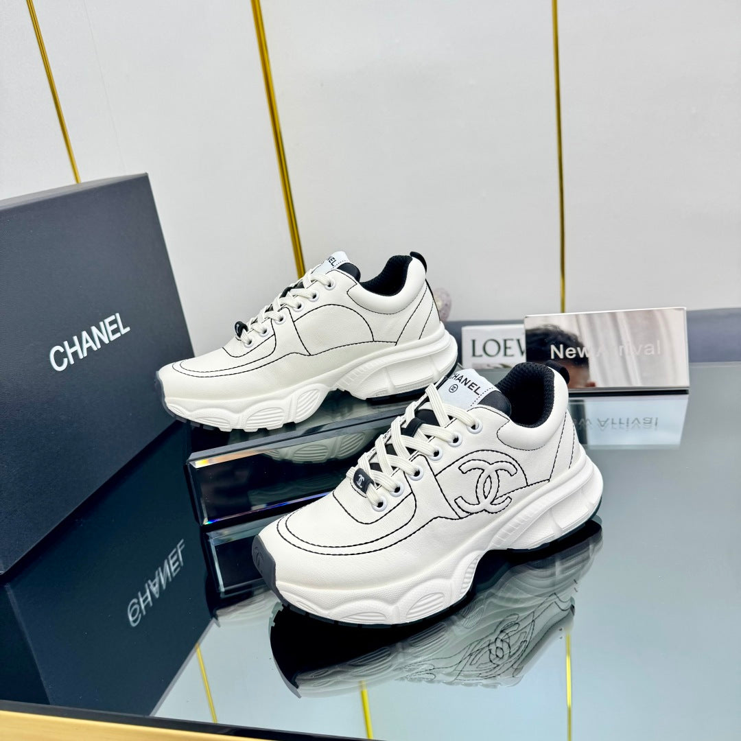 TRAINERS SNEAKER IN WHITE CALFSKIN WITH BLACK EMBROIDERED