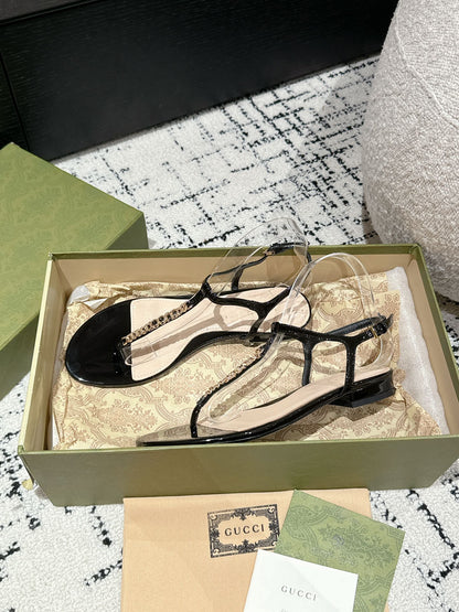 THONG SANDAL IN BLACK CALFSKIN WITH GOLD HARDWARE