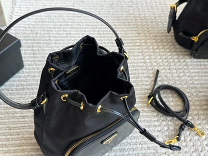 DRAWSTRING HOBO BAG 21 IN BLACK RE-NYLON AND CALFSKIN HANDLE