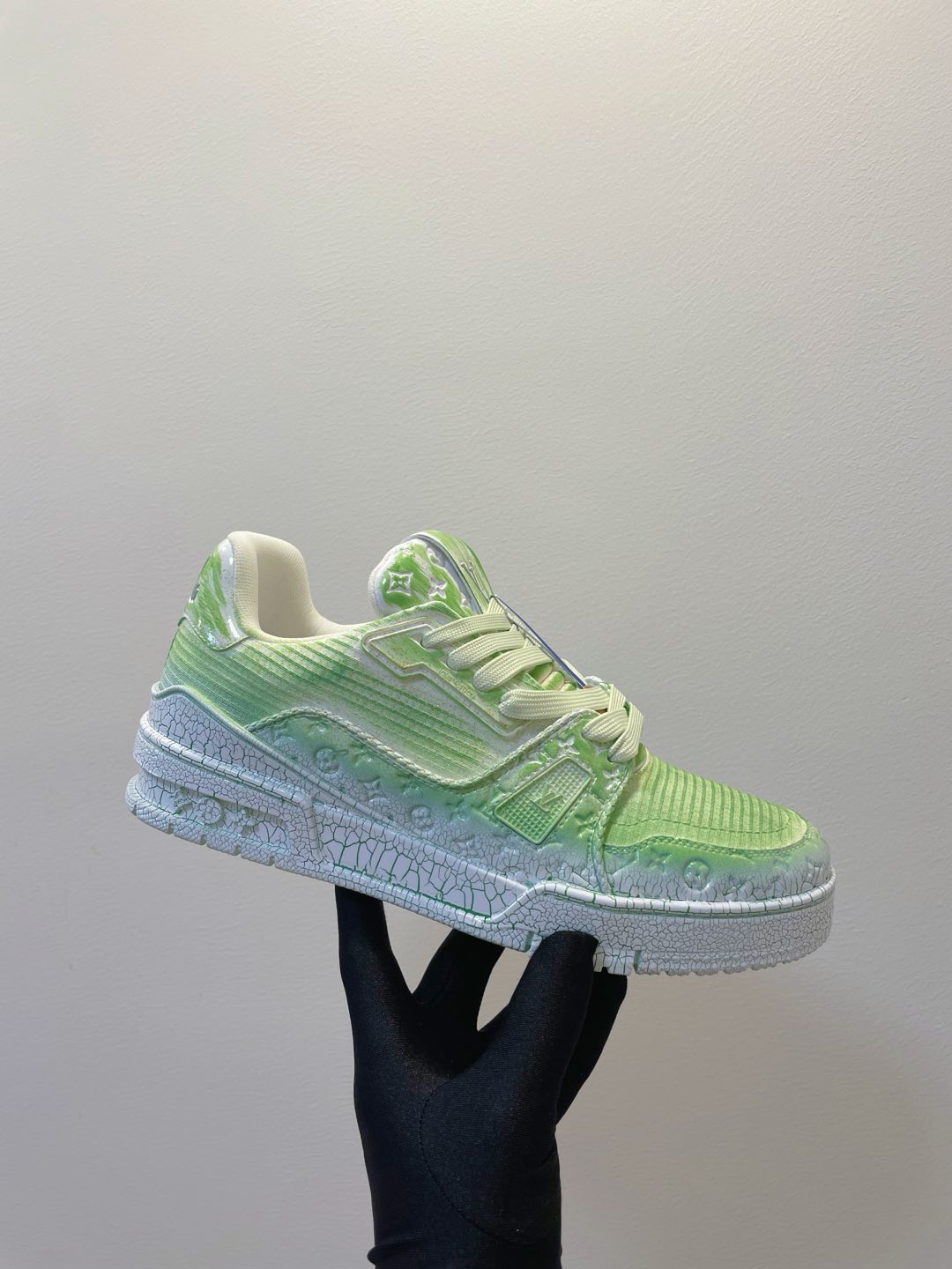 LV TRAINER MAXI SNEAKER IN GREEN PASTEL EMBOSSED CALFSKIN