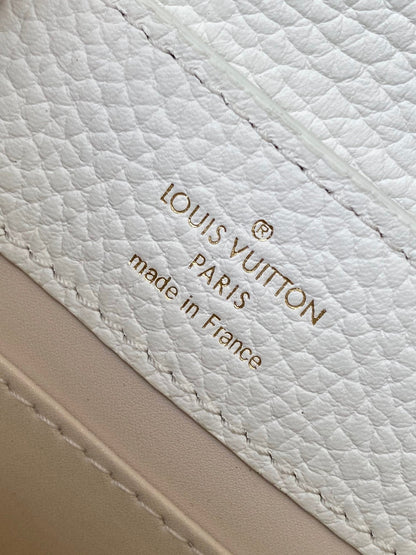 CAPUCINES EAST-WEST MINI 21 IN WHITE TAURILLON LEATHER GOLD-TONE HARDWARE