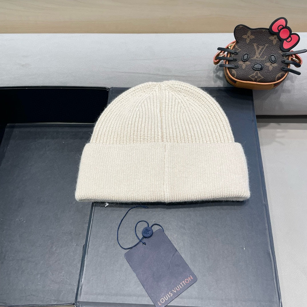 KNITTED BEANIE HAT IN BEIGE FLEECE AND WOOL 426207