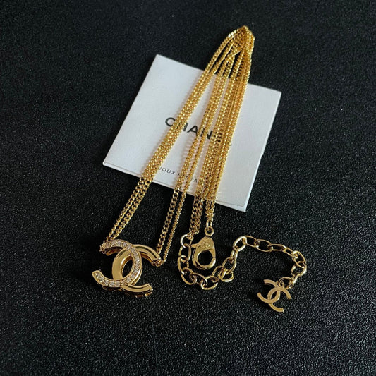 DOUBLE C HEART NECKLACE IN GOLD METAL