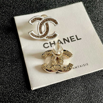DOUBLE C STUD EARRINGS WITH WHITE TRIM AND CENTER STONE
