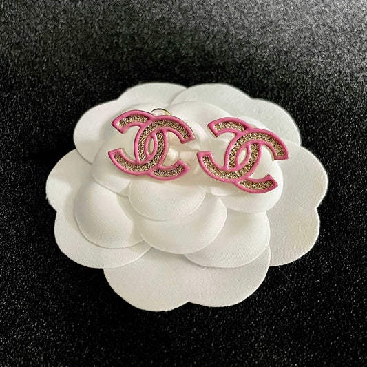 DOUBLE C STUD EARRINGS WITH PINK TRIM AND CENTER STONE