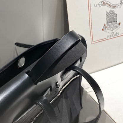 HERBAG A DOS ZIP RETOURNE BACKPACK 29 IN BLACK CANVAS AND CALFSKIN