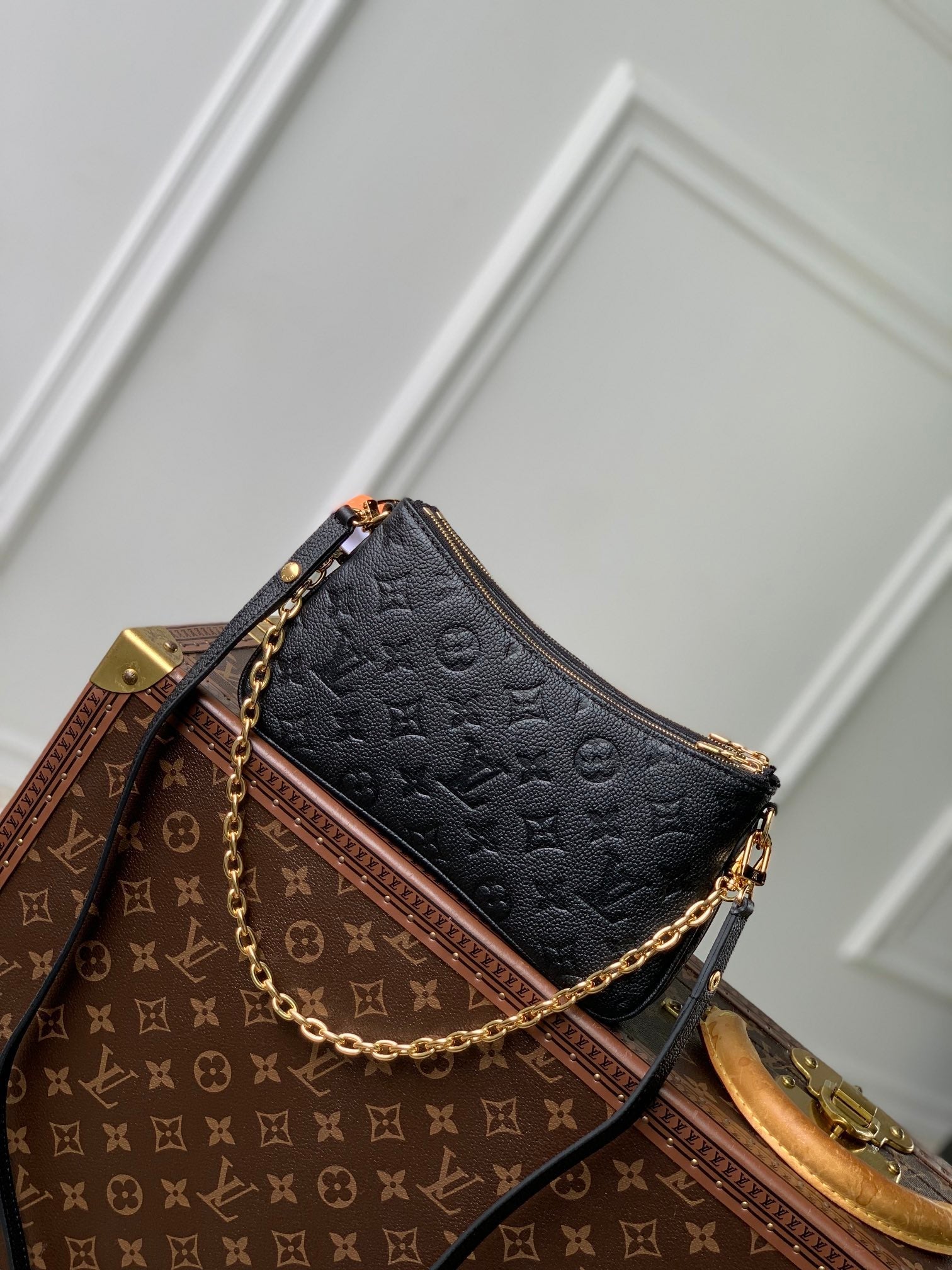 LIV POCHETTE BAG 24 IN BLACK MONOGRAM EMPREINTE LEATHER