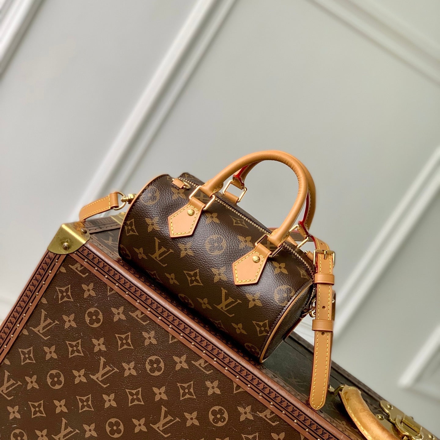 NANO SPEEDY DATING 18 IN BROWN COATED CANVAS GOLD HARDWARE