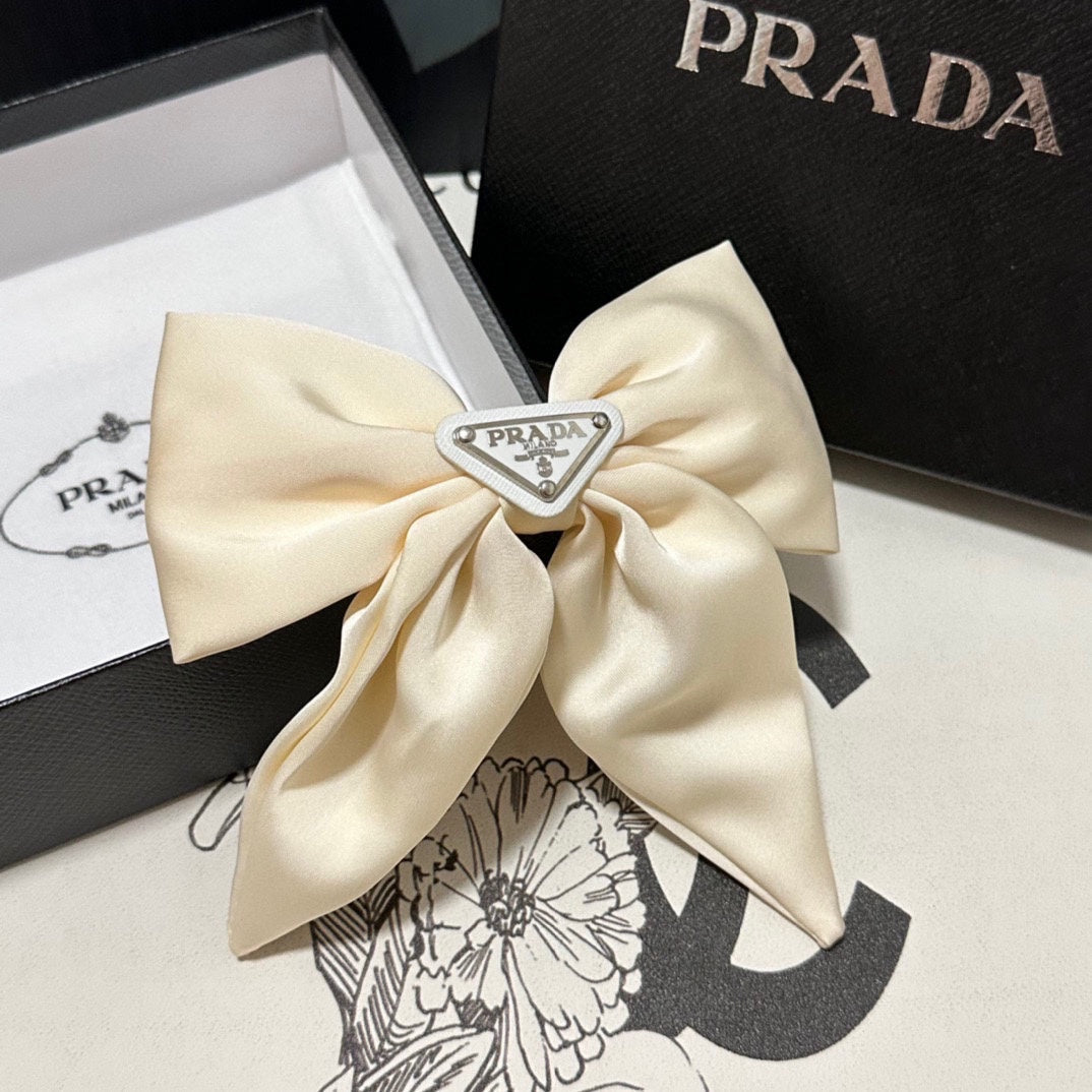 BOW-KNOT HAIR CLIP IN EGG SHELL SILK 358294