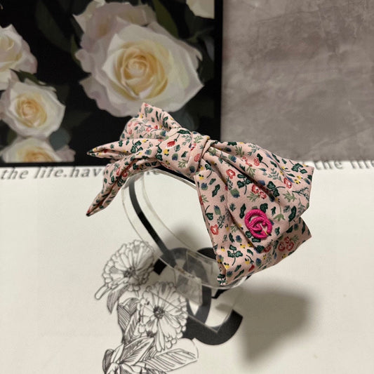 HAIRBAND IN LIGHT PINK FLORAL FABRIC 385853