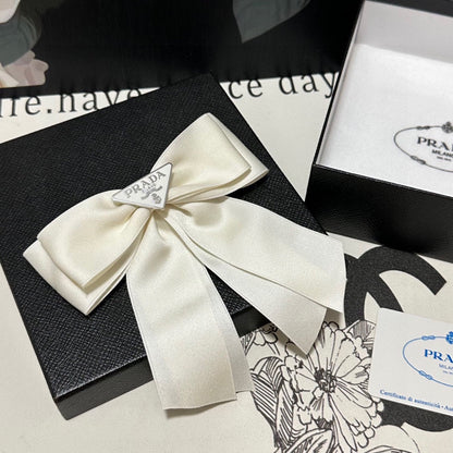 BOW HAIR CLIP IN BREEZY BEIGE RE-NYLON 423592