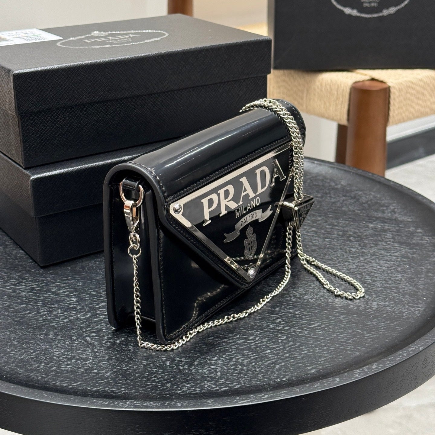 TRIANGLE LOGO WALLET ON CHAIN 19 IN BLACK SAFFIANO LEATHER