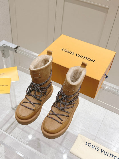 ASPEN PLATFORM ANKLE BOOT IN CIDER BROWN MONOGRAM DEBOSSED SUEDE AND SHEARLING