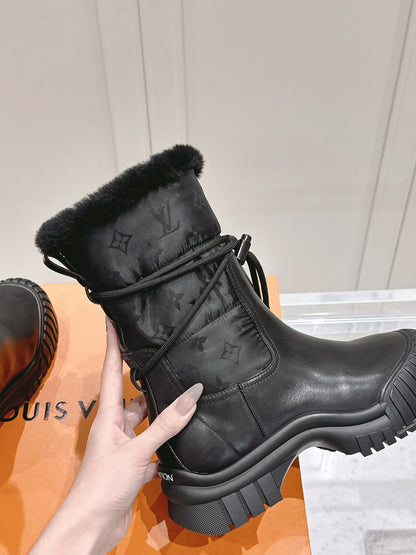 RUBY FLAT ANKLE BOOT IN BLACK CALFSKIN AND MONOGRAM NYLON