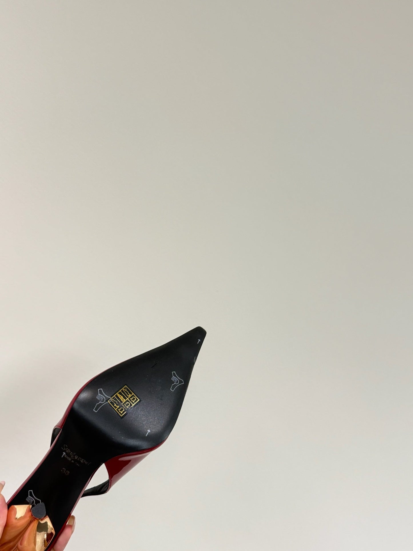 ORANGE GEM-STUDDED SLINGBACK PUMPS IN RED PATENT CALFSKIN