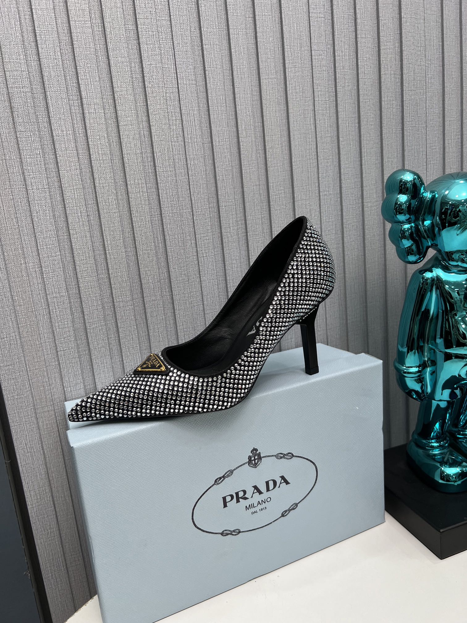 TRIANGLE LOGO HIGH-HEEL PUMPS IN BLACK SATIN WITH WHITE CRYSTALS