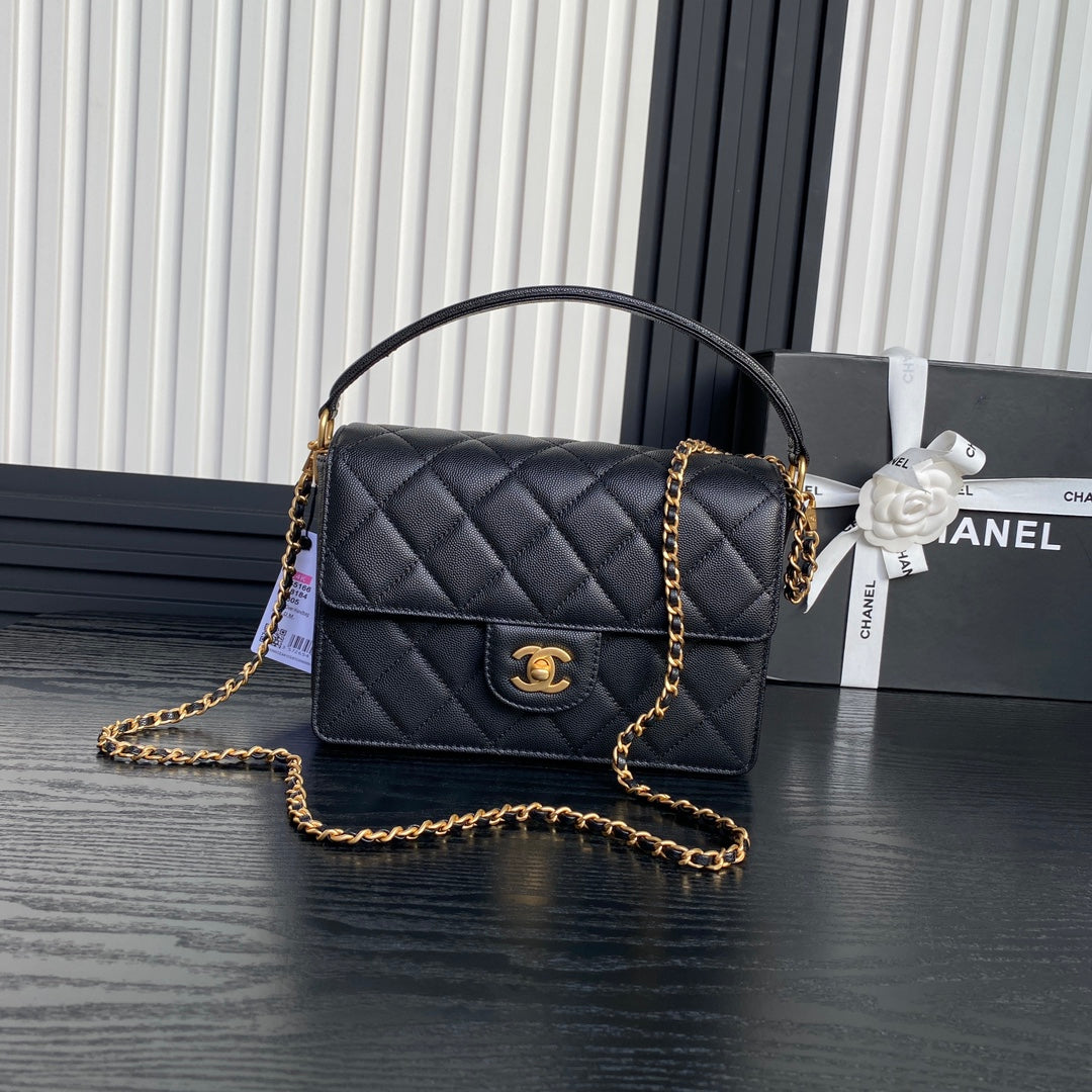 RETRO STYLE FLAP BAG 22 IN BLACK GRAINED CALFSKIN GOLD HARDWARE