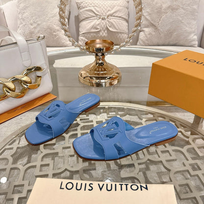 ISOLA FLAT SLIDE IN CORNFLOWER BLUE CALFSKIN