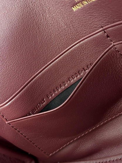 BEL AIR CLUTCH 27 IN BURGUNDY RED NAPPA LAMBSKIN GOLD HARDWARE