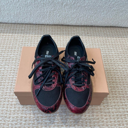 GYMNASIUM SNEAKER IN BLACK FABRIC AND BLACK RED SNAKE EFFECT CALFSKIN